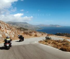 riding along the rugged coastline of Mani peninsula, on tour with MotoGreece POV shot of group of motorcyclists riding along the rugged coastline of Mani peninsula, on tour with MotoGreece