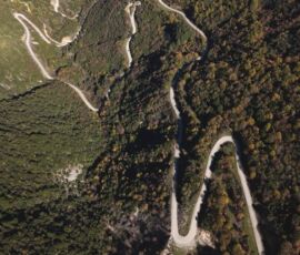 mountain road near Aristi village, drone view, by MotoGreece mountain road near Aristi village, drone view, by MotoGreece