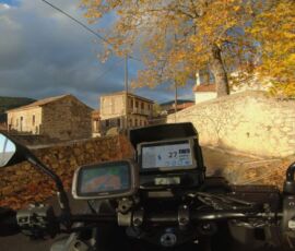 navigating the narrow roads of traditional villages in Elis, touring with Motogreece